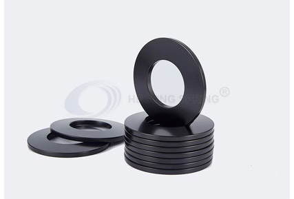 What is the Applicable Temperature of the Disc Spring Material?